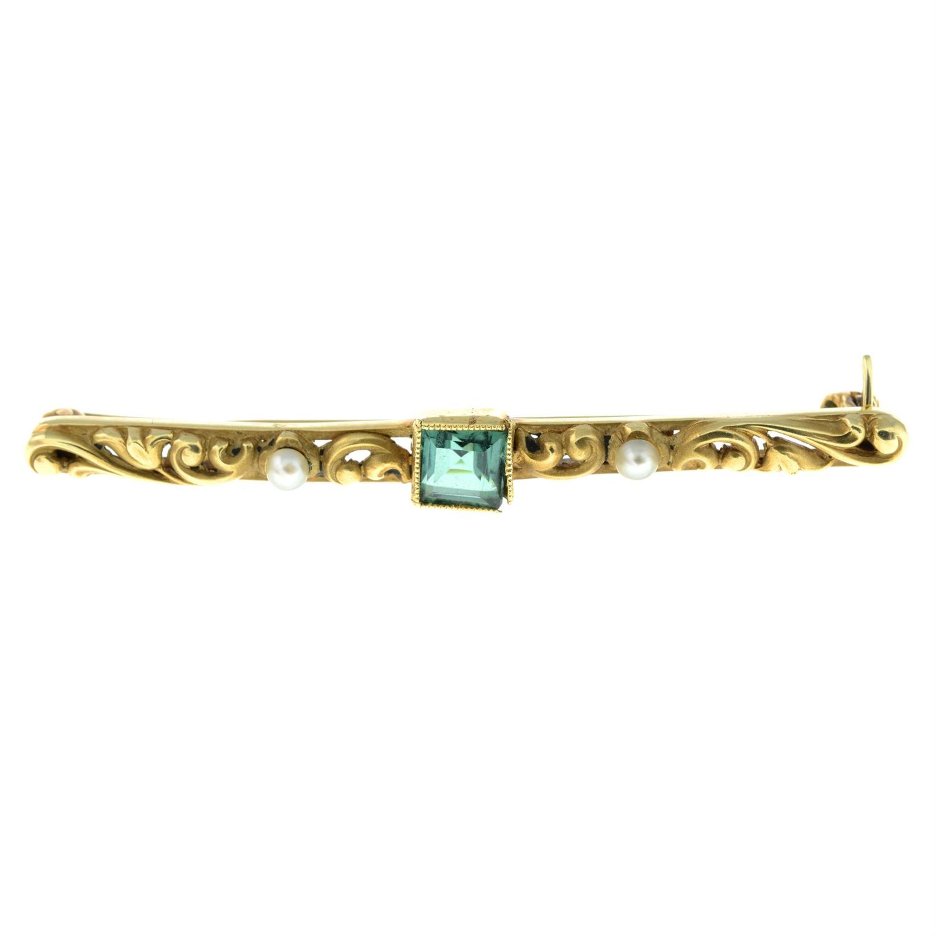 An early 20th century 14ct gold tourmaline and split pearl bar brooch.