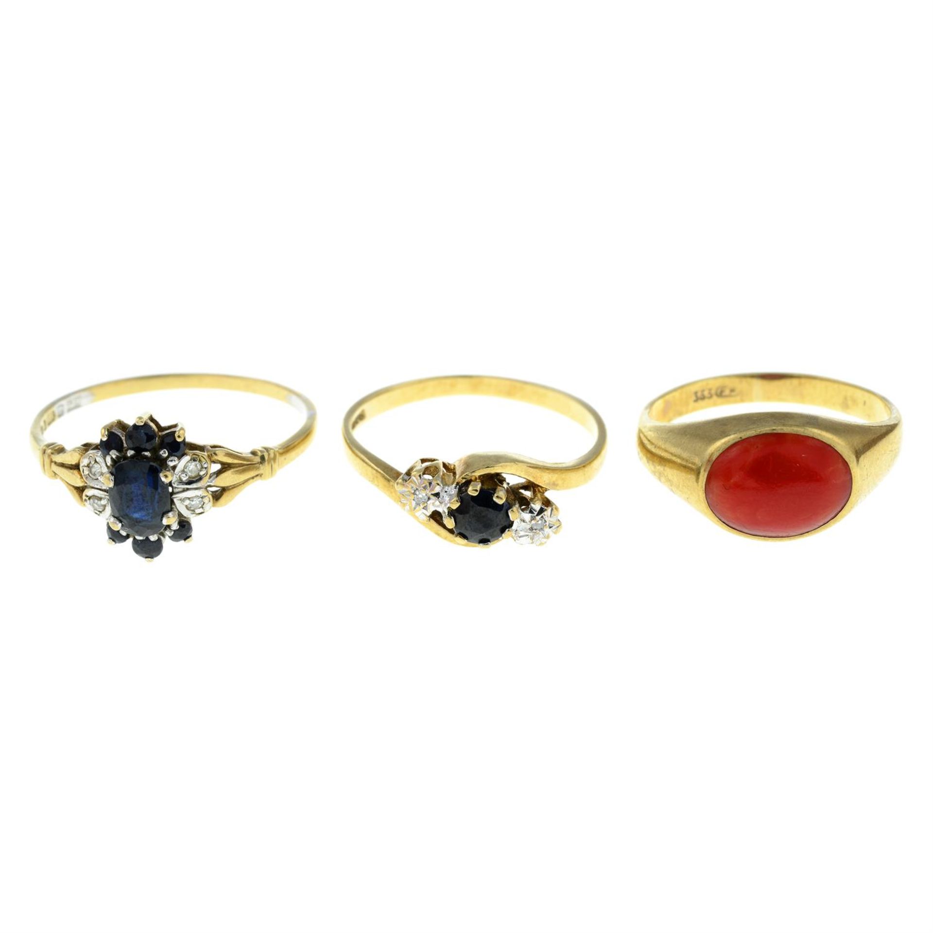 Two 9ct gold sapphire and diamond rings, together with a coral signet ring.