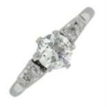 A mid 20th century old-cut diamond single-stone ring, with diamond shoulders.