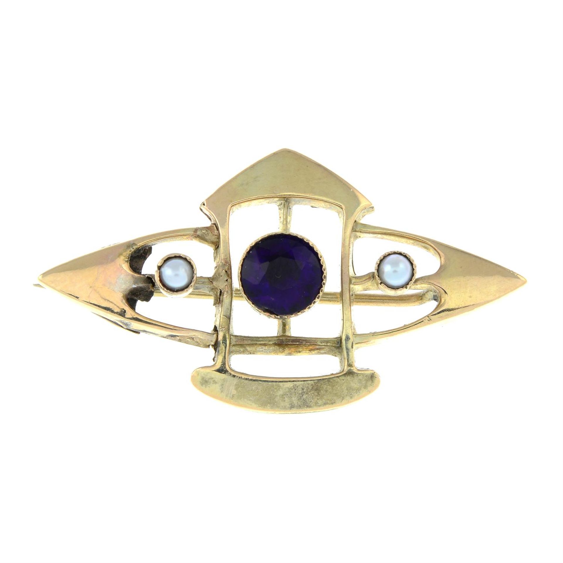 An early 20th century 9ct gold amethyst and split pearl brooch.