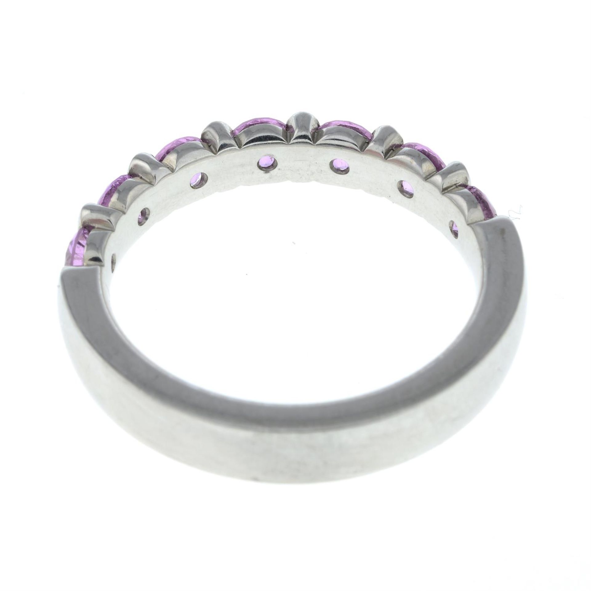 An 18ct gold pink sapphire half eternity ring. - Bild 2 aus 2