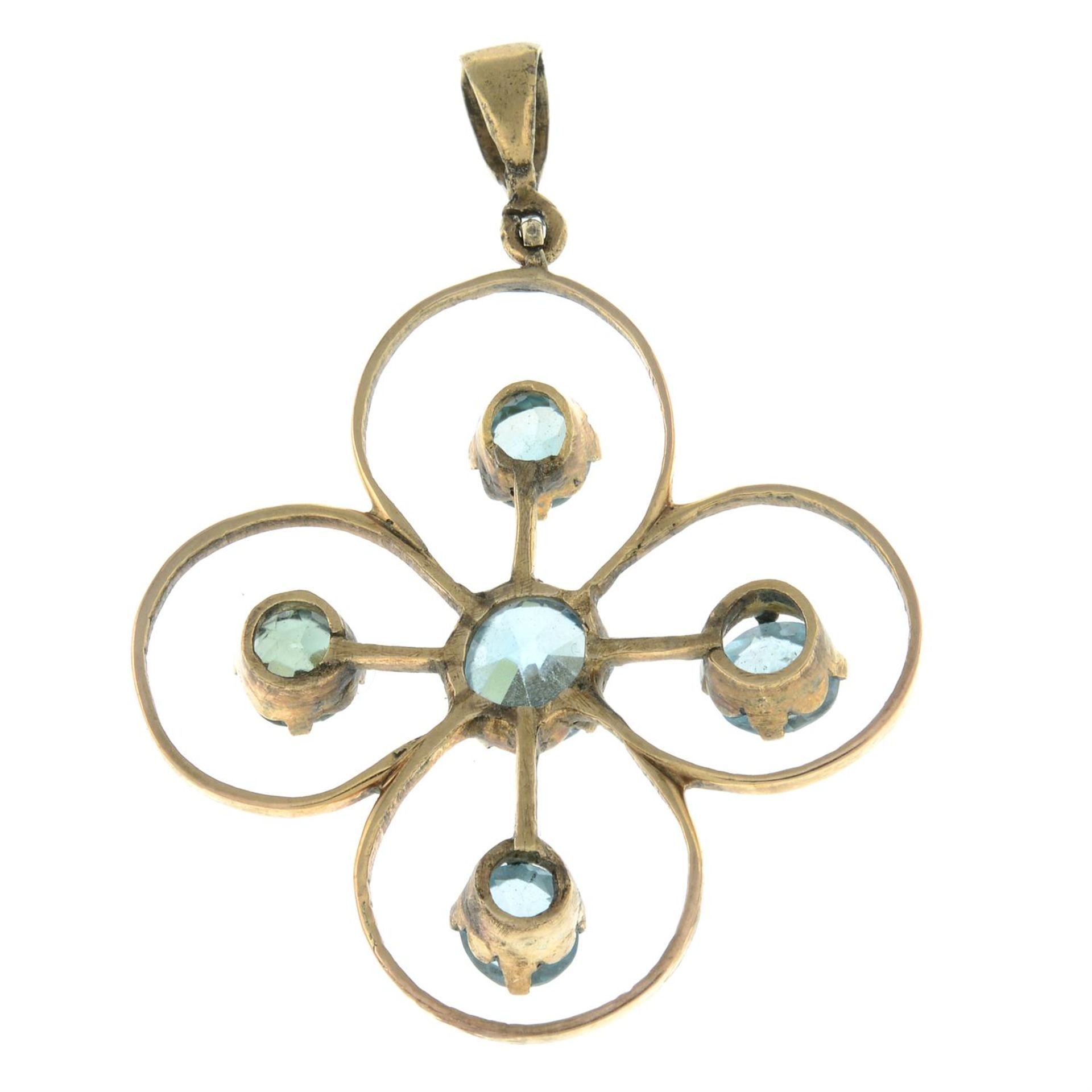 An early 20th century gold blue zircon floral openwork pendant. - Image 2 of 2