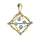 An early 20th century 15ct gold blue zircon, split pearl and seed pearl openwork pendant.