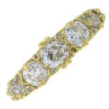 An Edwardian 18ct gold old-cut diamond five-stone ring, with rose-cut diamond spacers.