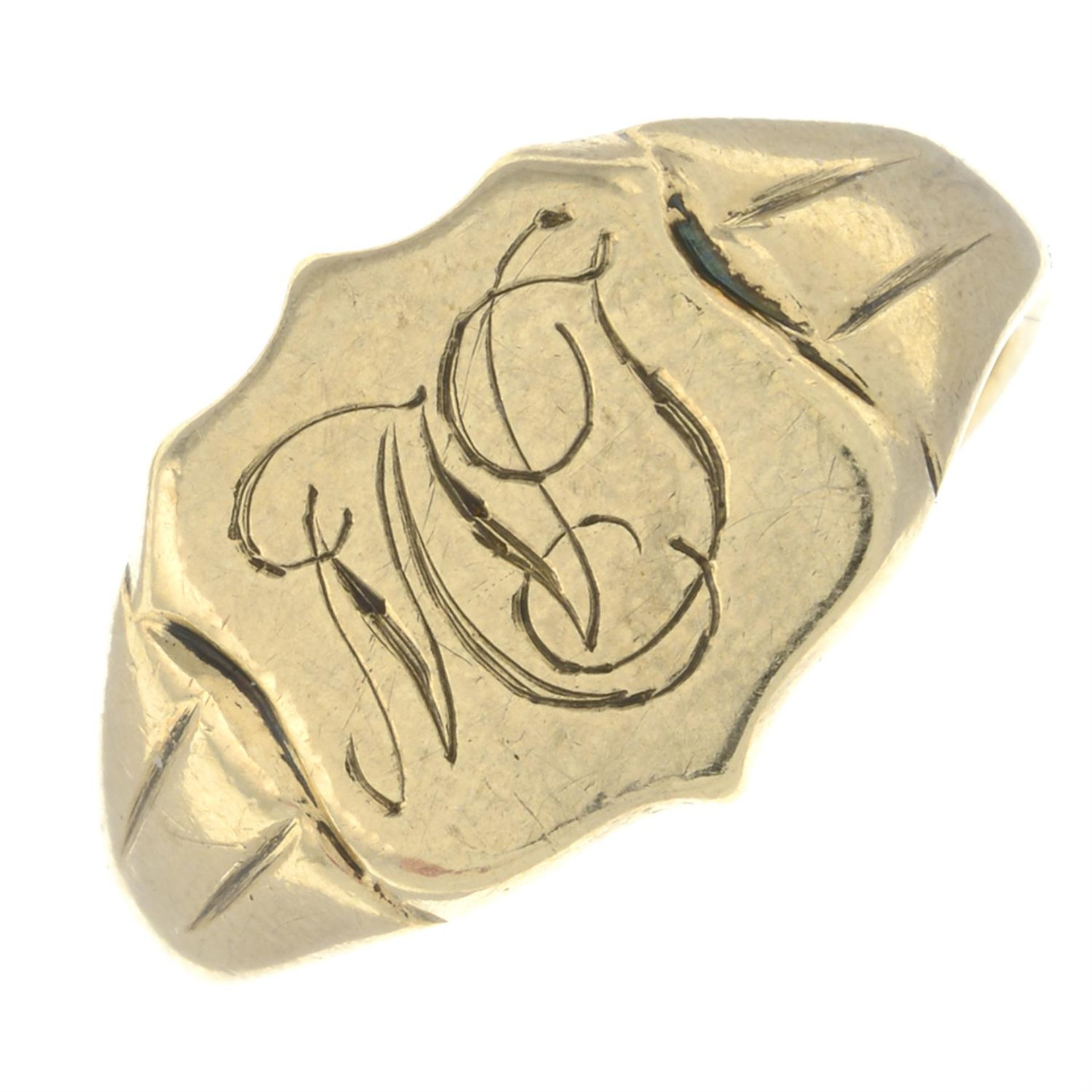 A 1960s 9ct gold shield-shape signet ring, with monogram 'MVJ'.