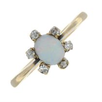 An early to mid 20th century gold opal and old-cut diamond cluster ring.