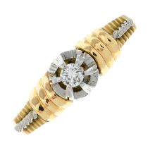 A brilliant-cut diamond single stone bi-colour ring.