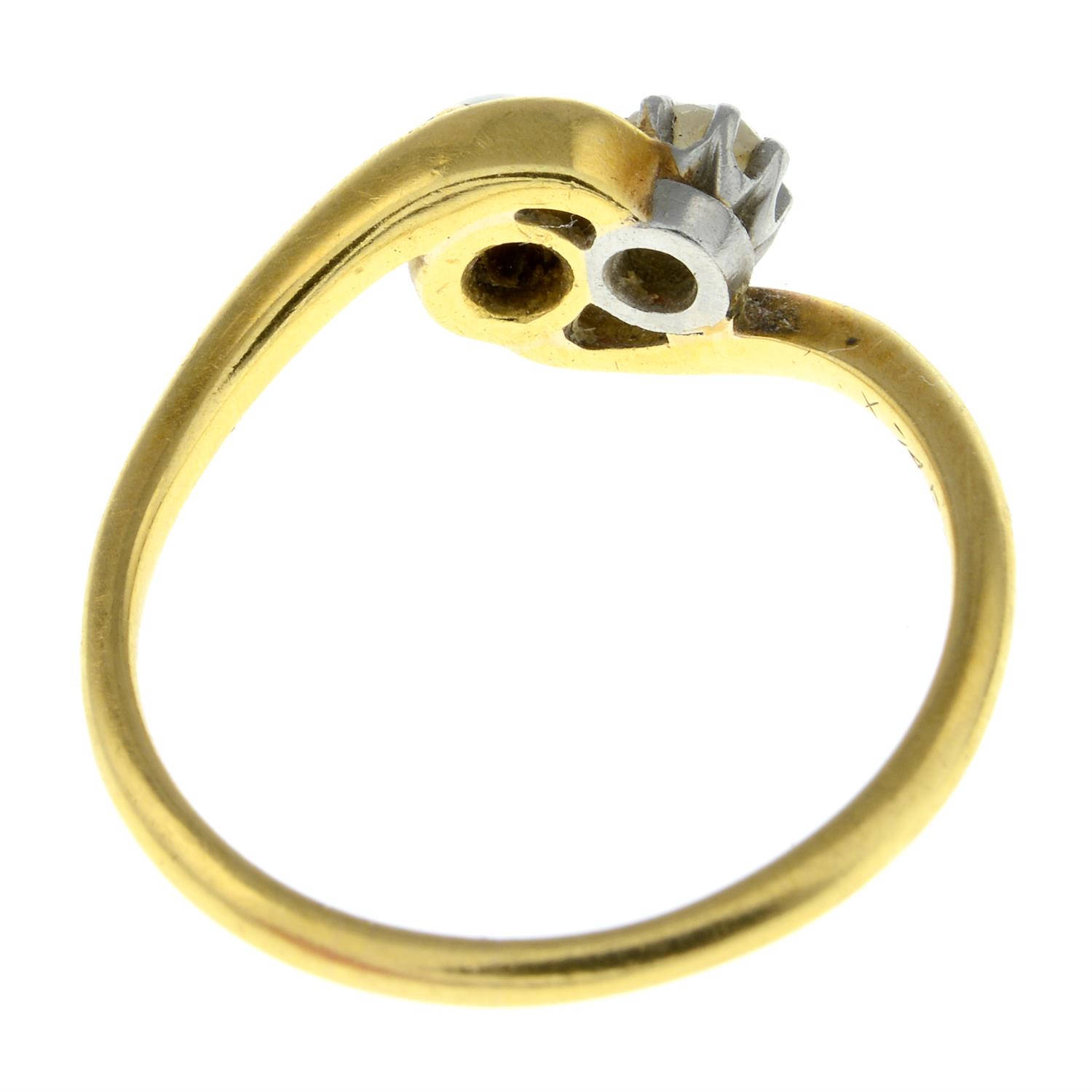 An early 20th century 18ct gold old-cut diamond and split pearl crossover ring. - Image 2 of 2