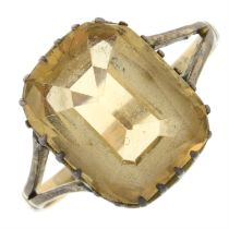An early 20th century gold yellow topaz single-stone ring.