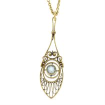A 19th century gold aquamarine cannetille pendant, with chain.