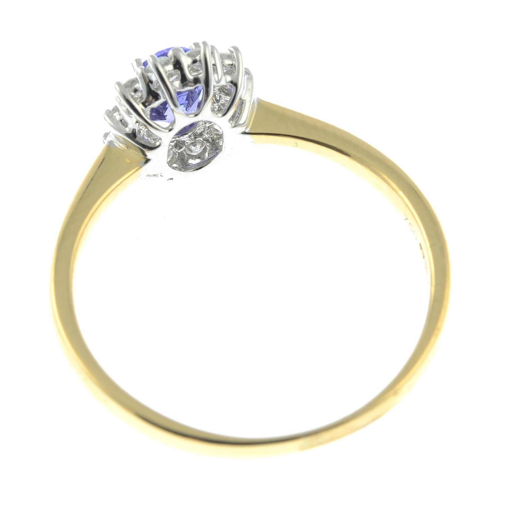 An 18ct gold tanzanite and diamond cluster ring. - Image 2 of 2