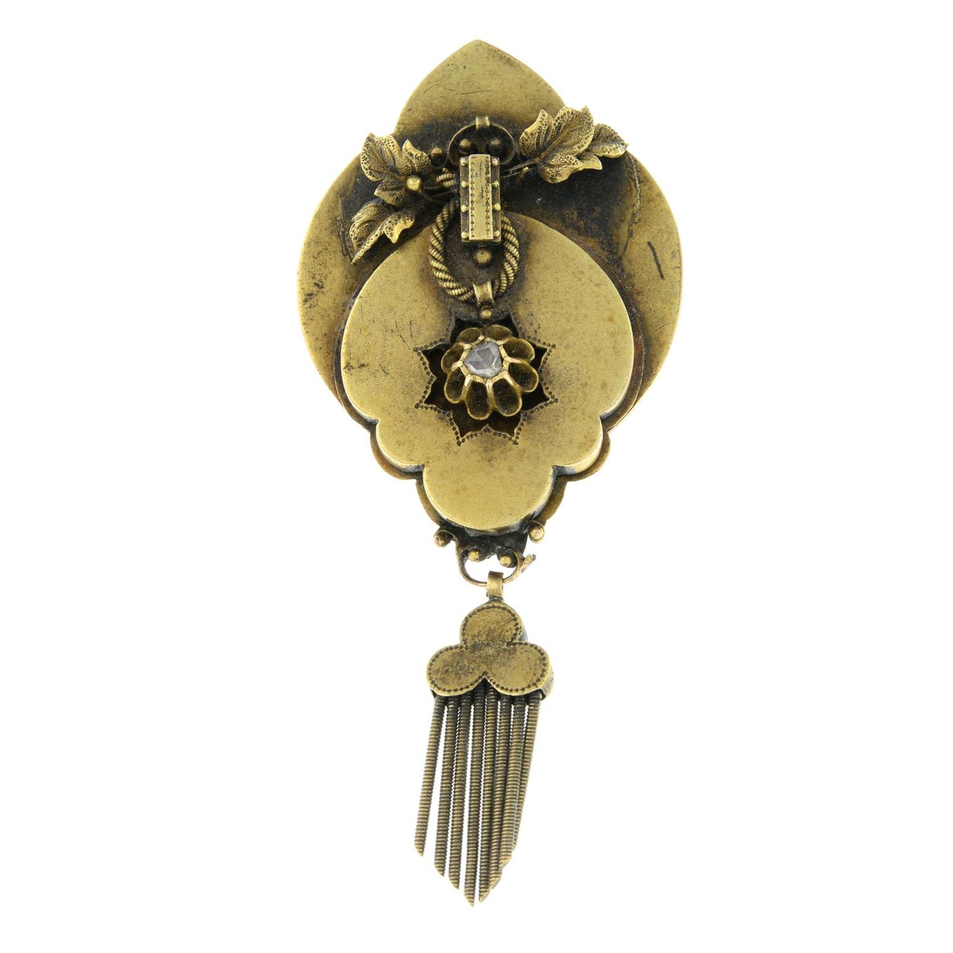 A late Victorian gold rose-cut diamond foliate swag pendant/brooch.