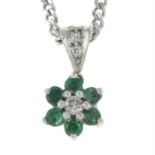 An 18ct gold emerald and brilliant-cut diamond cluster pendant, on curb-link chain.