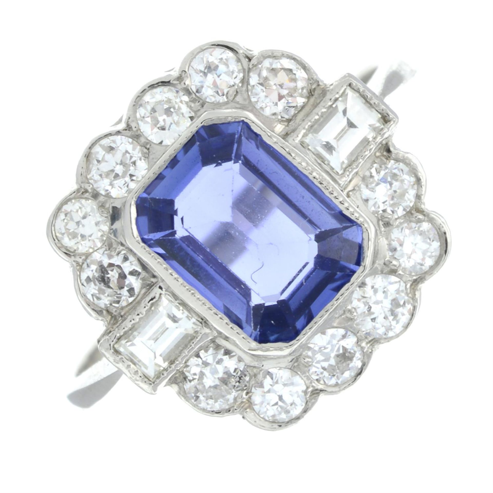 A sapphire and vari-cut diamond cluster ring.