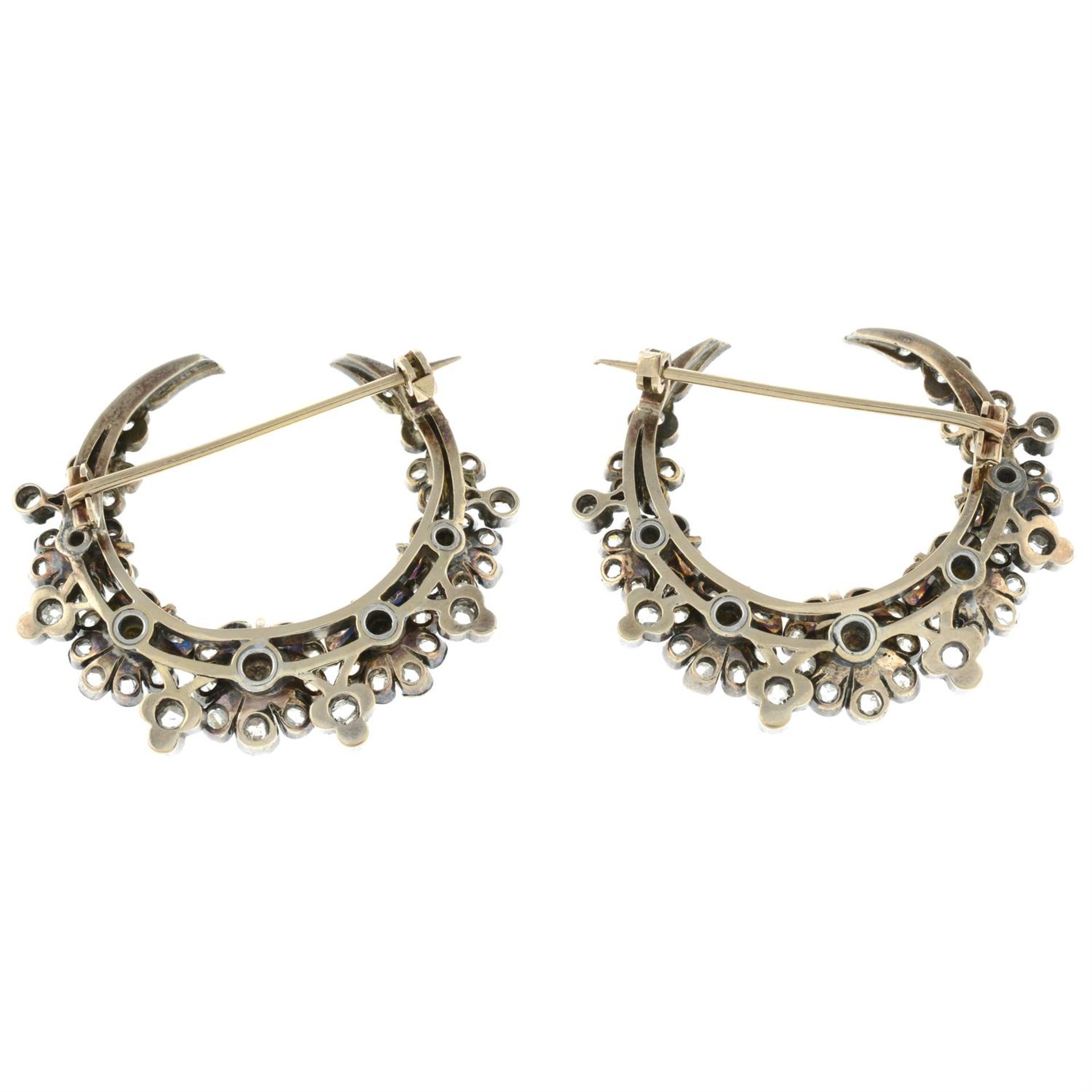 A pair of late Victorian silver and gold seed pearl and rose-cut diamond floral crescent moon - Image 2 of 2