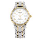 LONGINES - a bi-colour Golden Wing bracelet watch, 34mm.