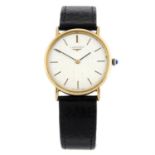 LONGINES - a 9ct yellow gold wrist watch, 32mm.