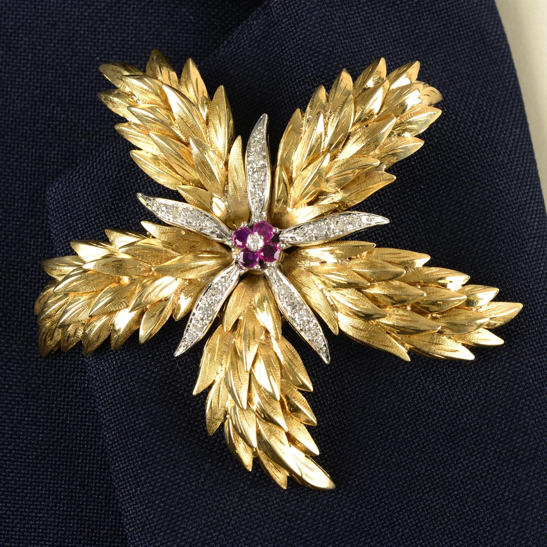 A mid 20th century 18ct gold brilliant-cut diamond and ruby floral brooch/pendant, by Tiffany & Co.