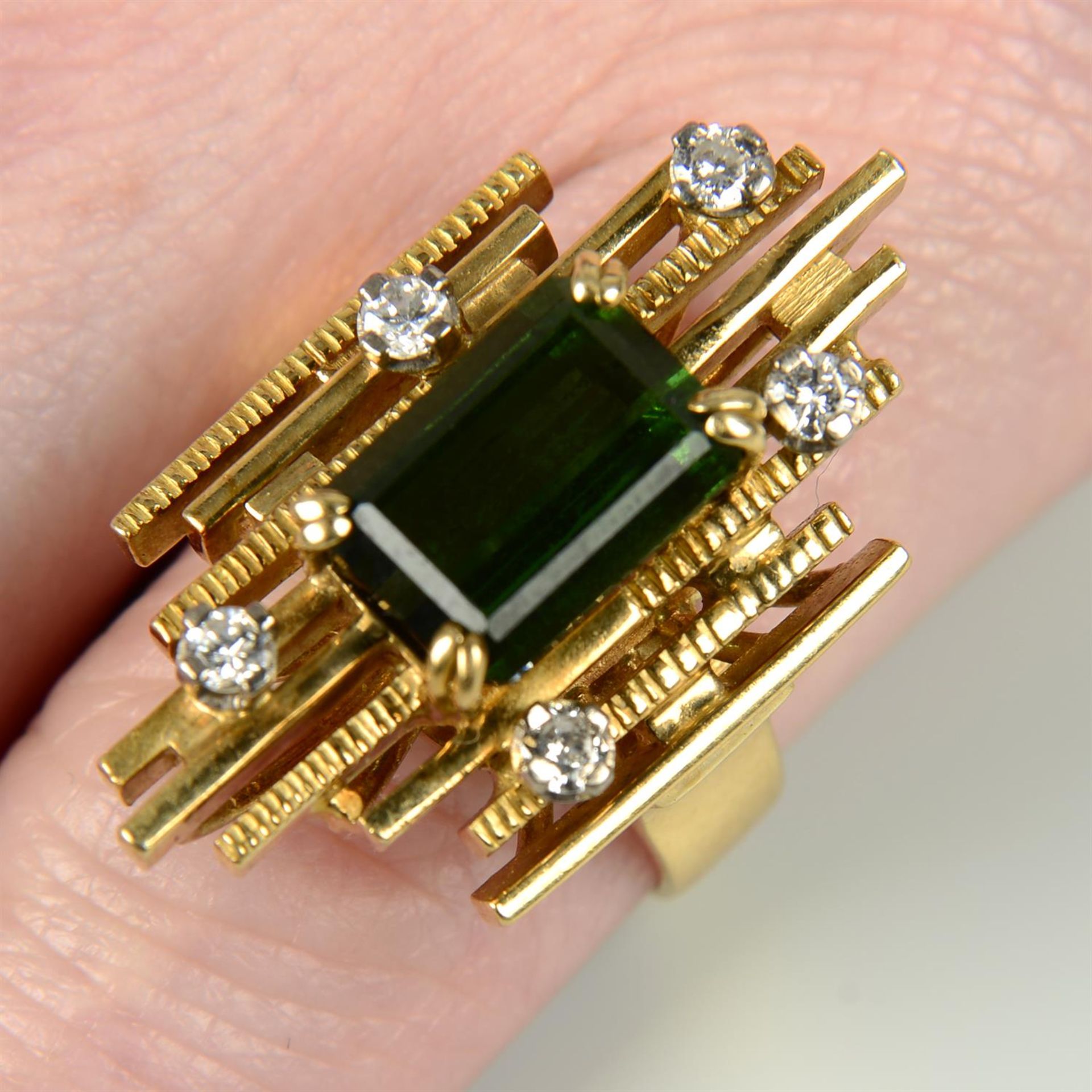 A 1970s 18ct gold green tourmaline and brilliant-cut diamond ring.