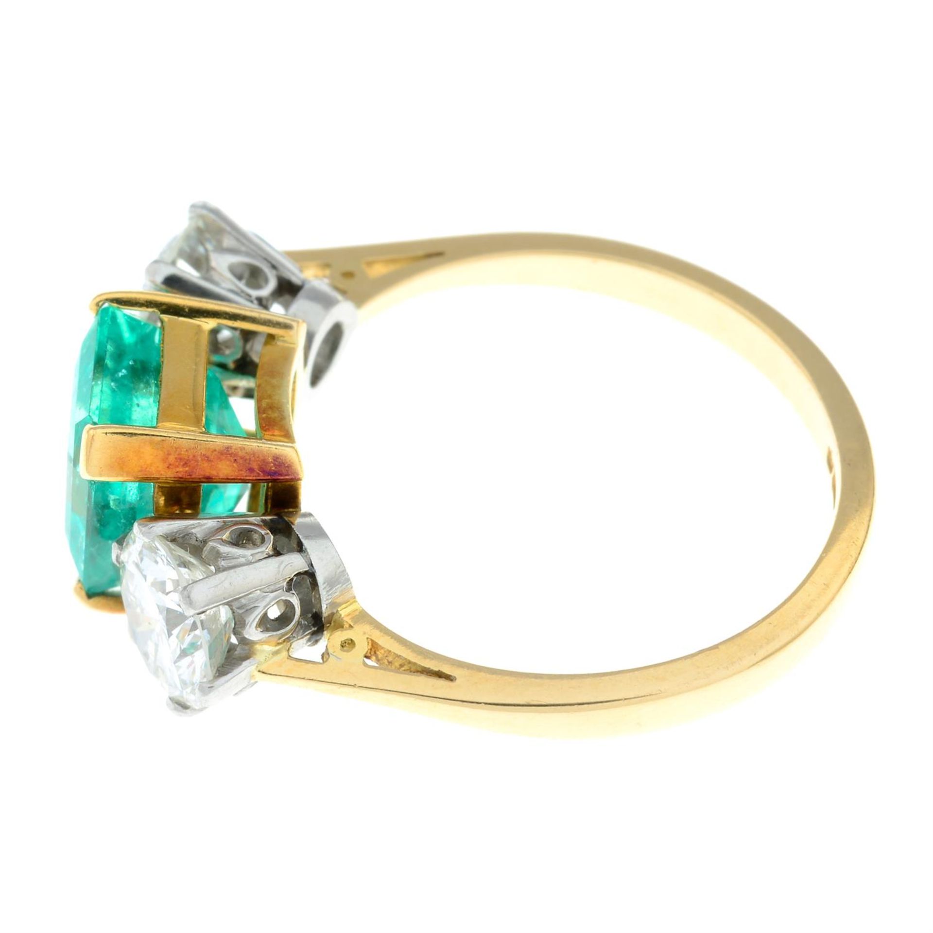 An 18ct gold emerald and brilliant-cut diamond three-stone ring. - Image 4 of 6