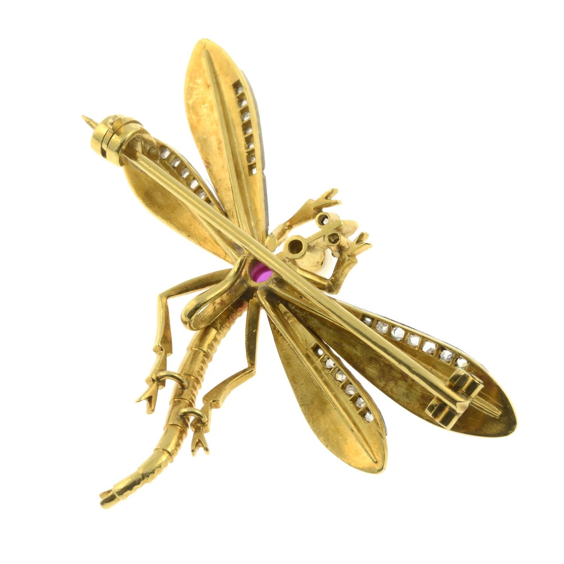 An early 20th century gold seed pearl, synthetic ruby cabochon and diamond point dragonfly brooch. - Image 3 of 4