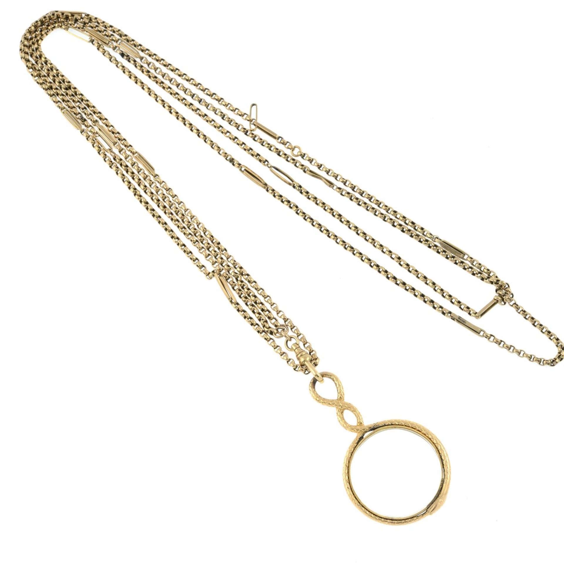 A late Georgian 15ct gold ouroboros snake magnifying glass, with late 19th century long guard chain. - Image 3 of 4