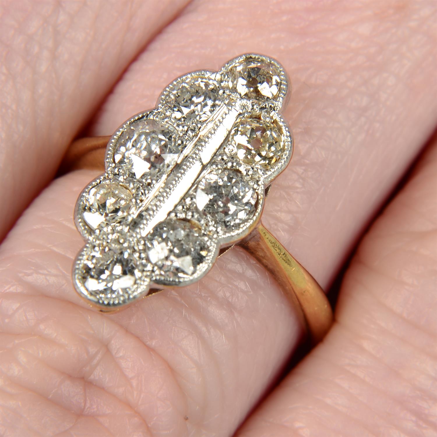 A late Victorian 18ct gold old-cut diamond scalloped marquise-shape ring.