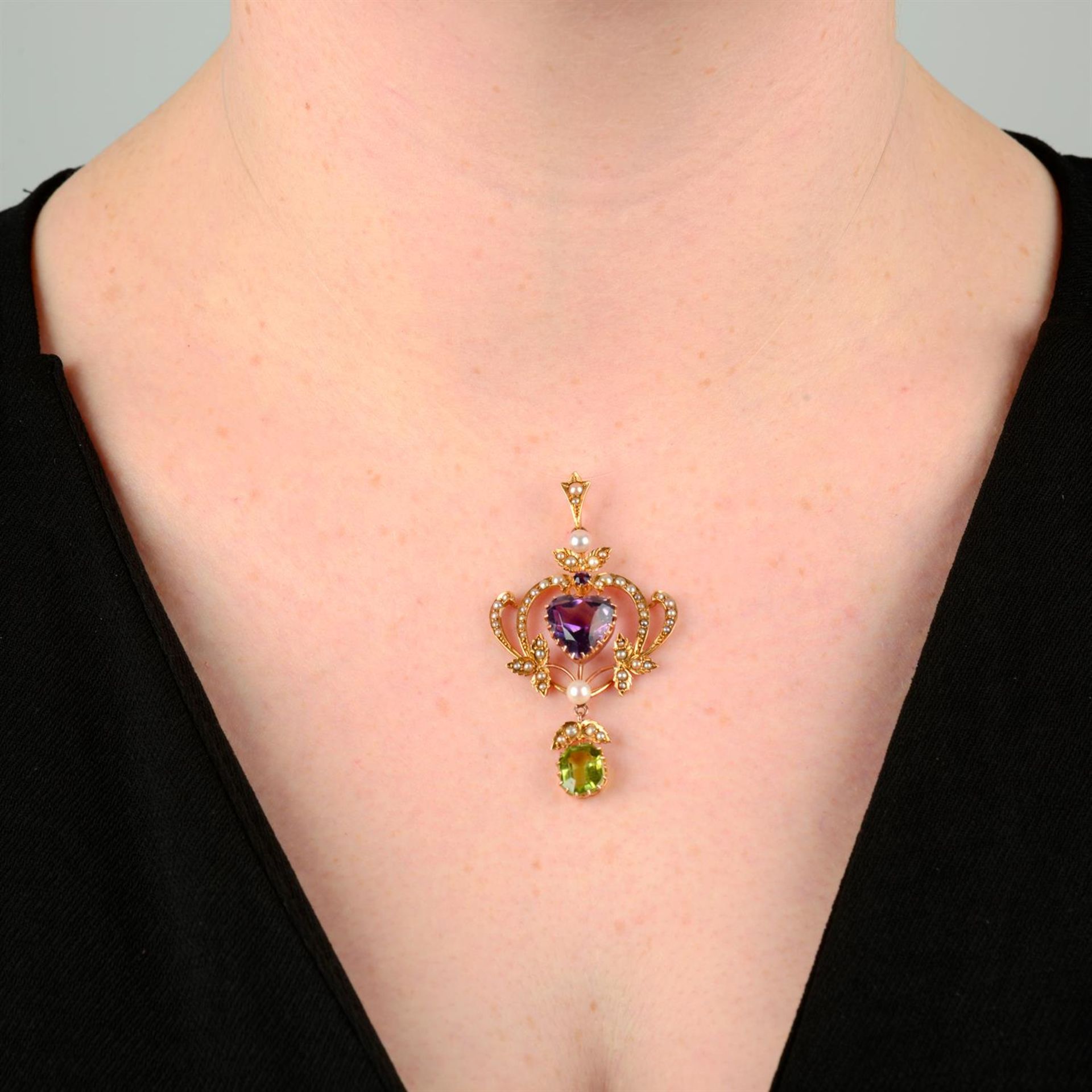 An early 20th century 15ct gold amethyst, peridot, pearl and split pearl pendant. - Image 4 of 4