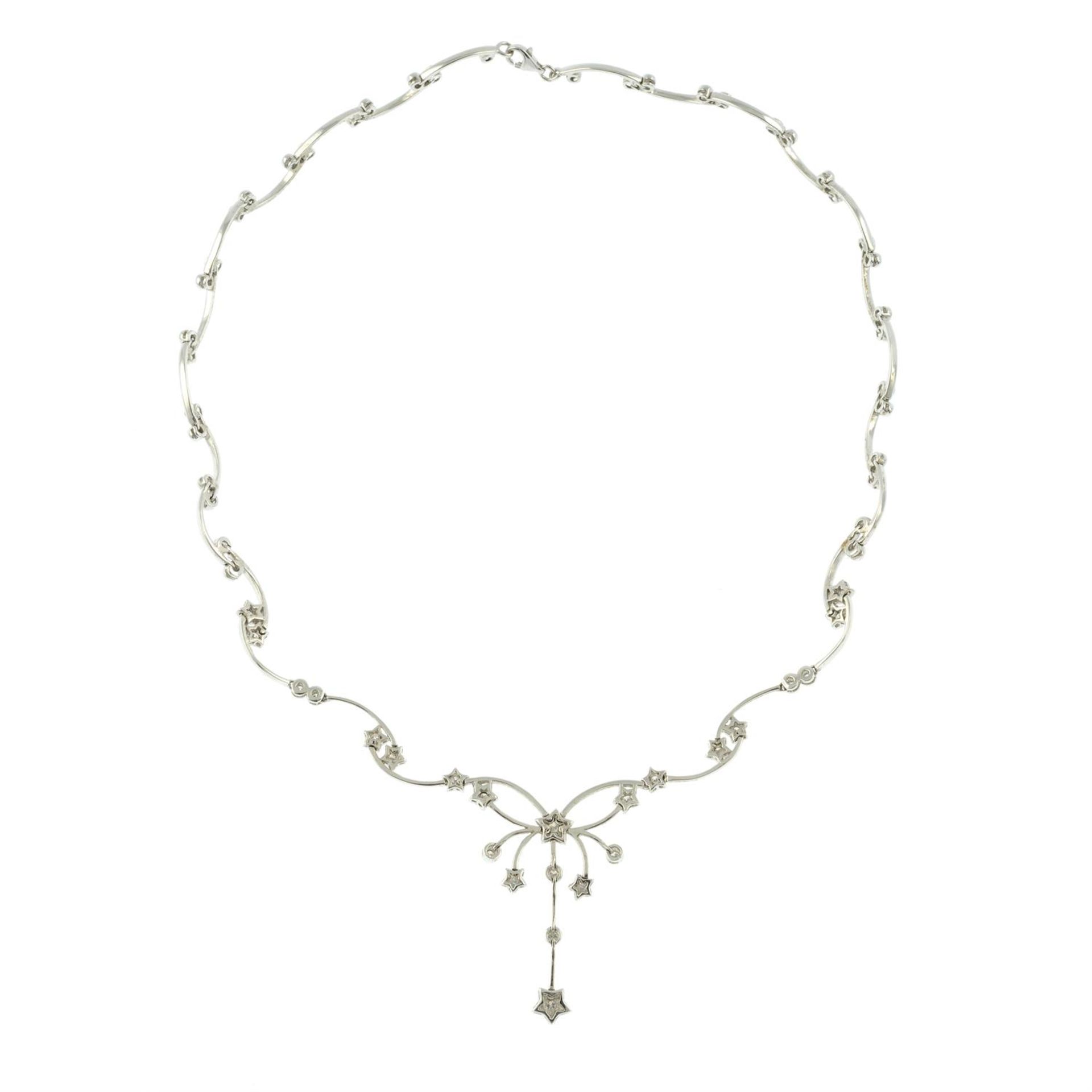 A brilliant-cut diamond star motif necklace. - Image 4 of 4