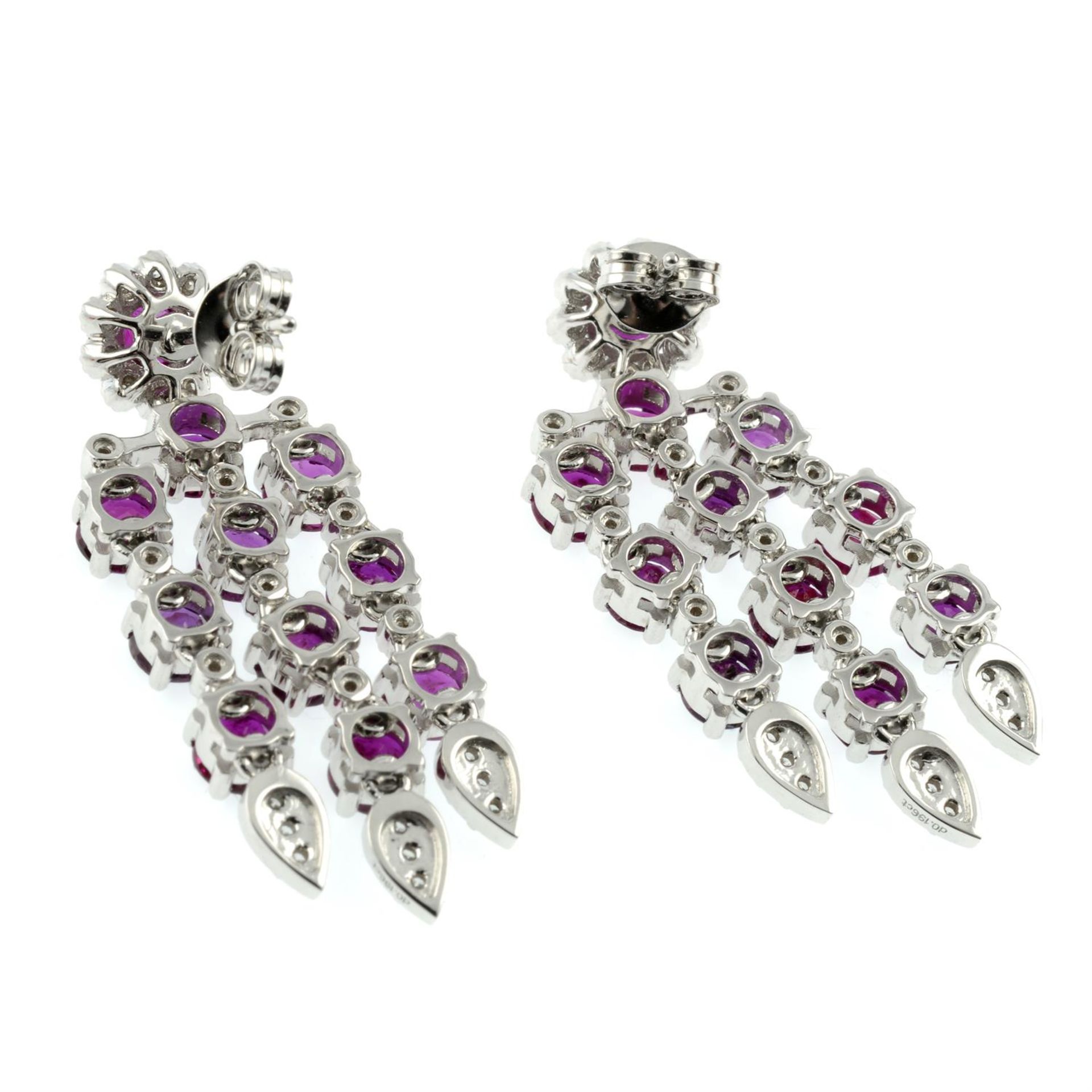 A pair of ruby and brilliant-cut diamond floral drop earrings. - Bild 3 aus 3