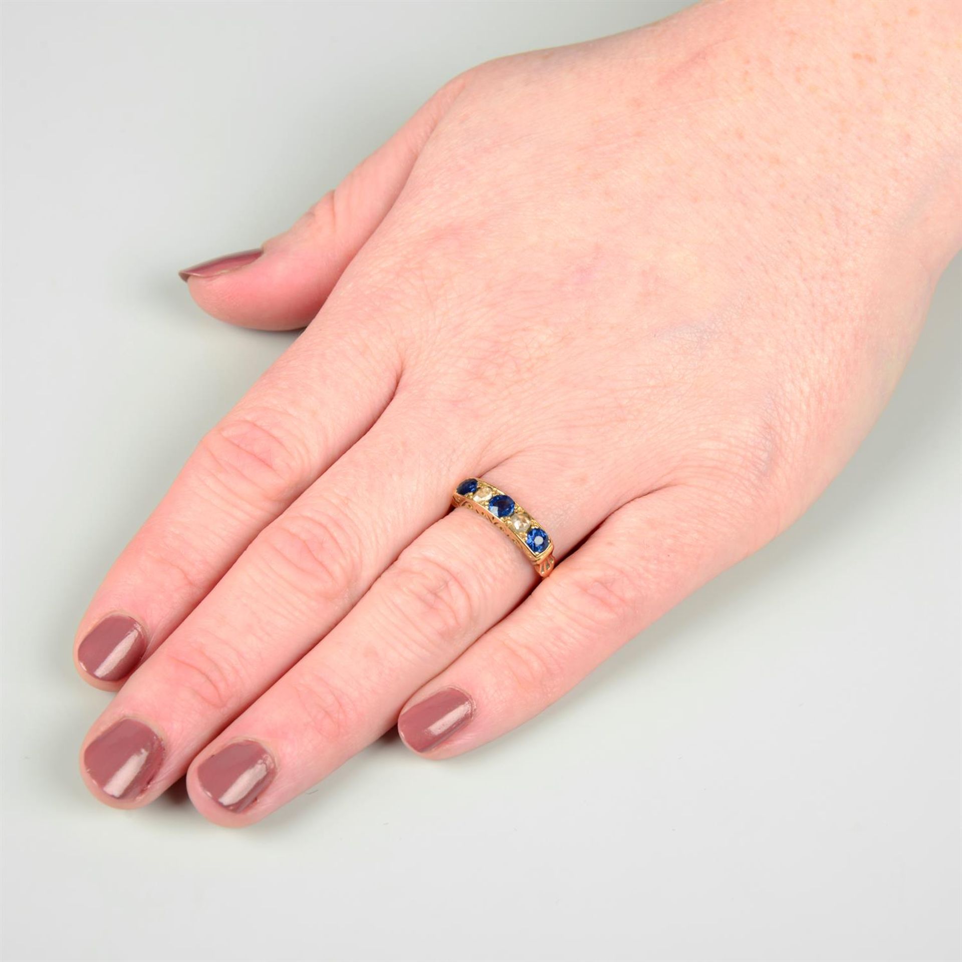 A late Victorian 18ct gold sapphire and rose-cut diamond five-stone ring. - Image 5 of 5