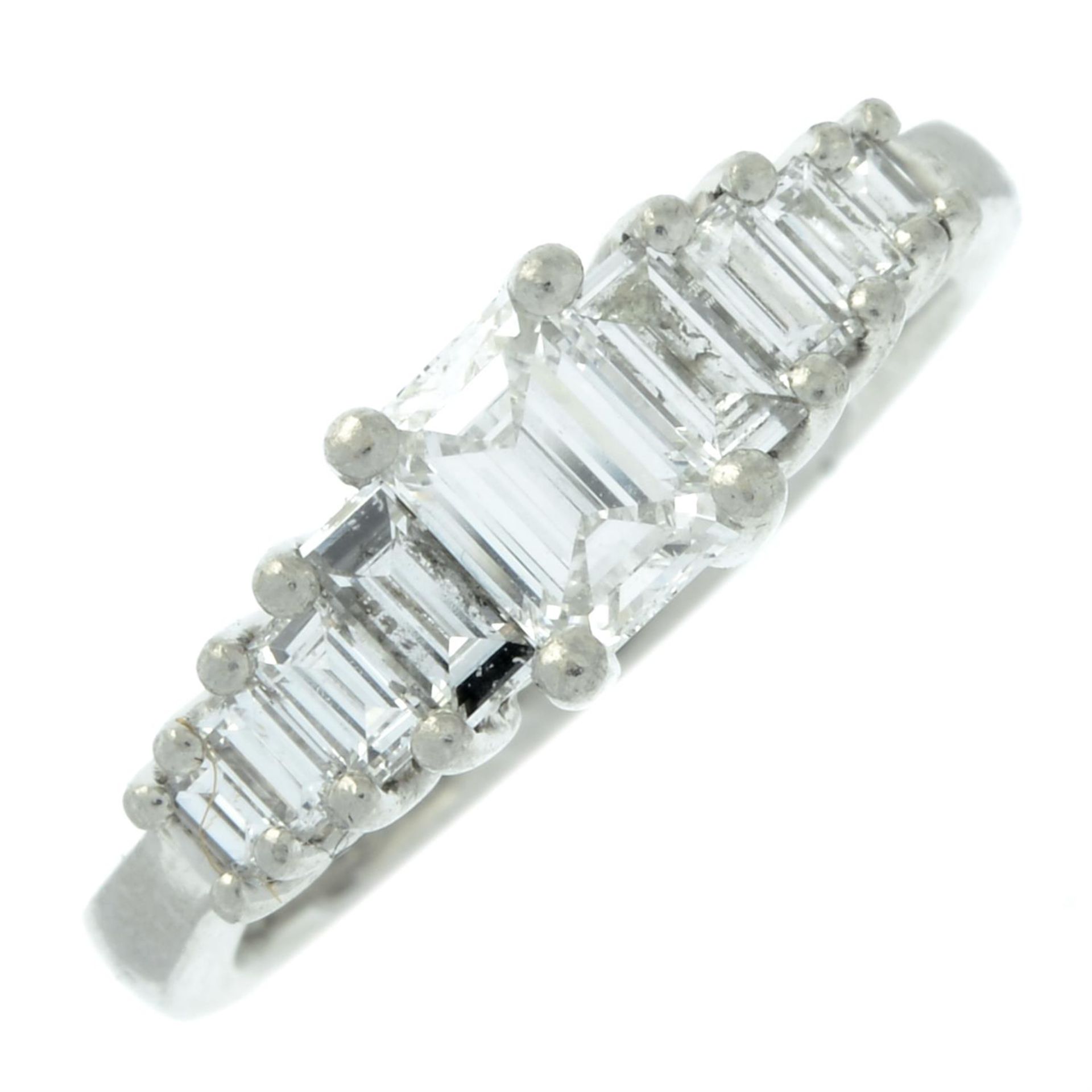 A platinum graduated baguette-cut diamond dress ring. - Image 2 of 5