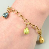 An 18ct gold enamel egg charm bracelet, by Fabergé.