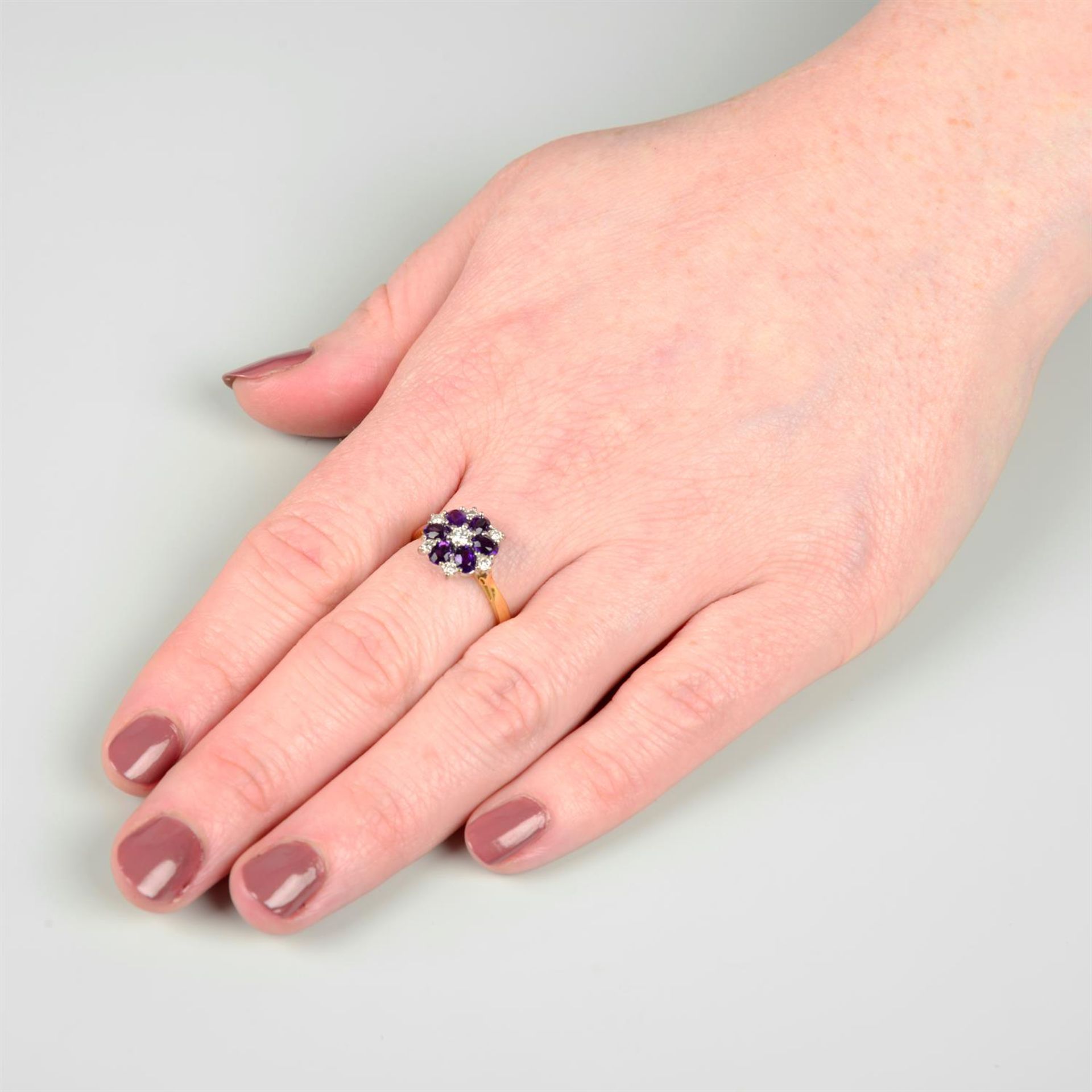 An 18ct gold amethyst and brilliant-cut diamond cluster ring. - Image 4 of 4