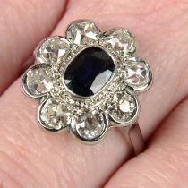 A sapphire and old-cut diamond cluster ring.