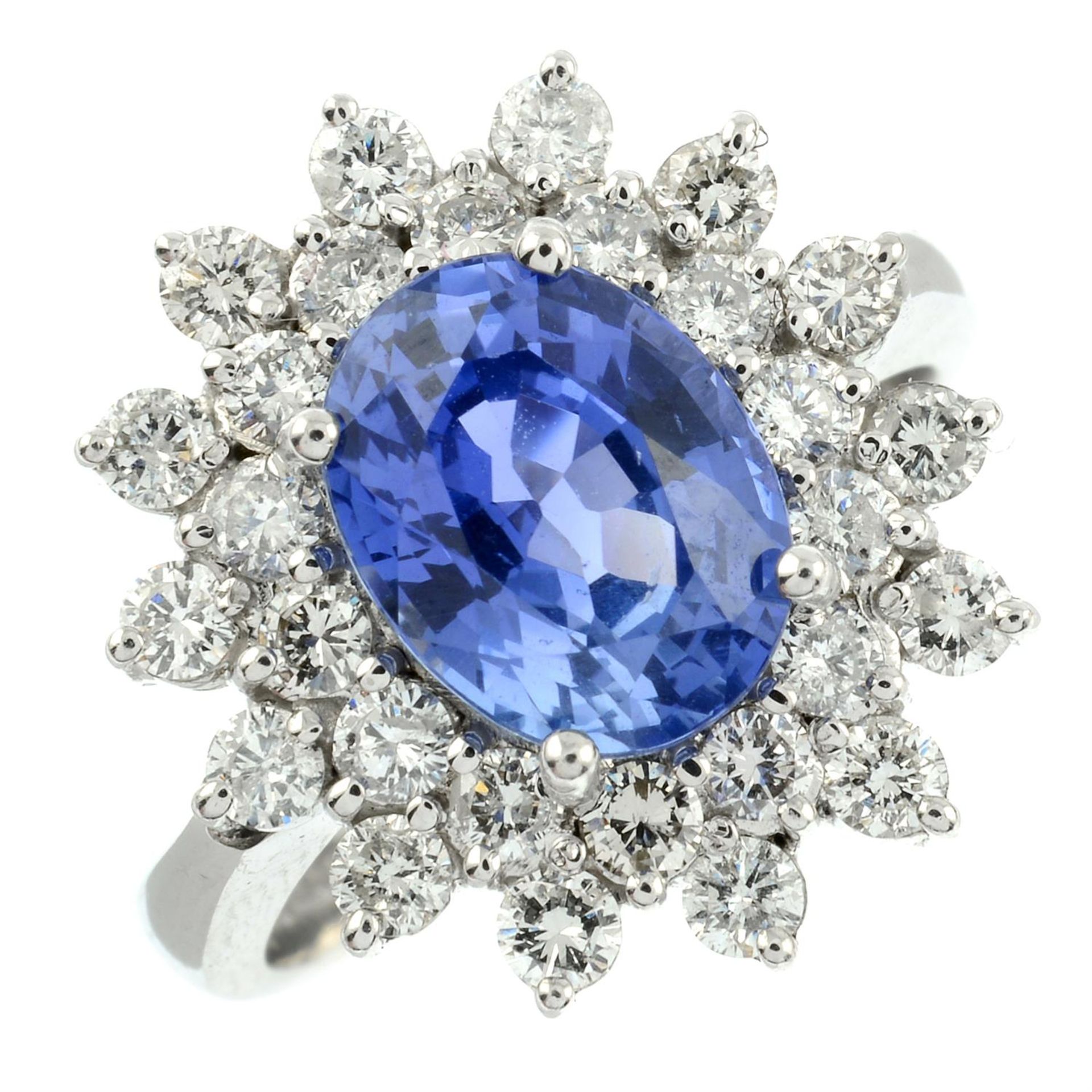 An 18ct gold brilliant-cut diamond and sapphire cluster ring. - Image 2 of 5