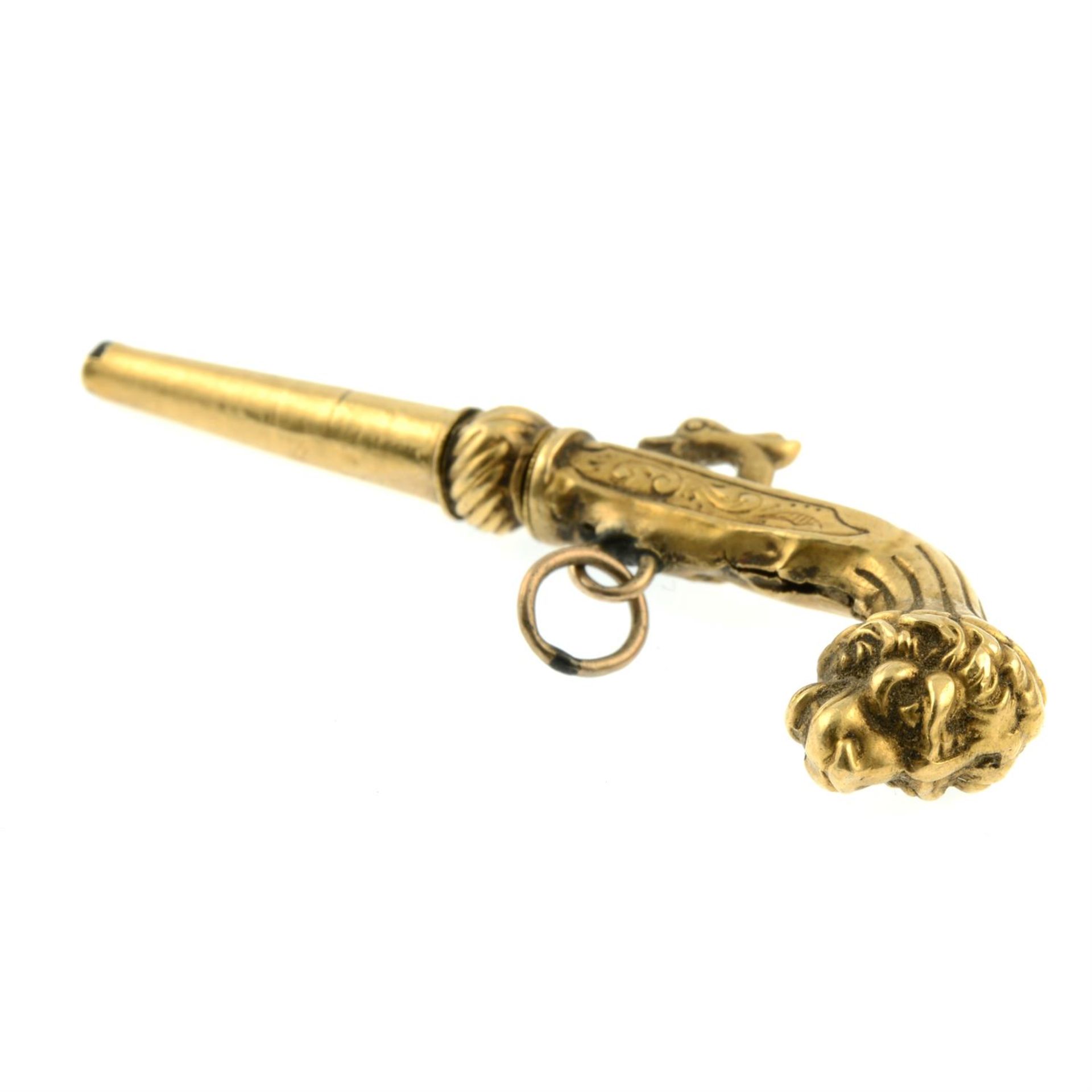 A 19th century 18ct gold watch key, modelled as a pistol with lion head grip. - Bild 3 aus 3