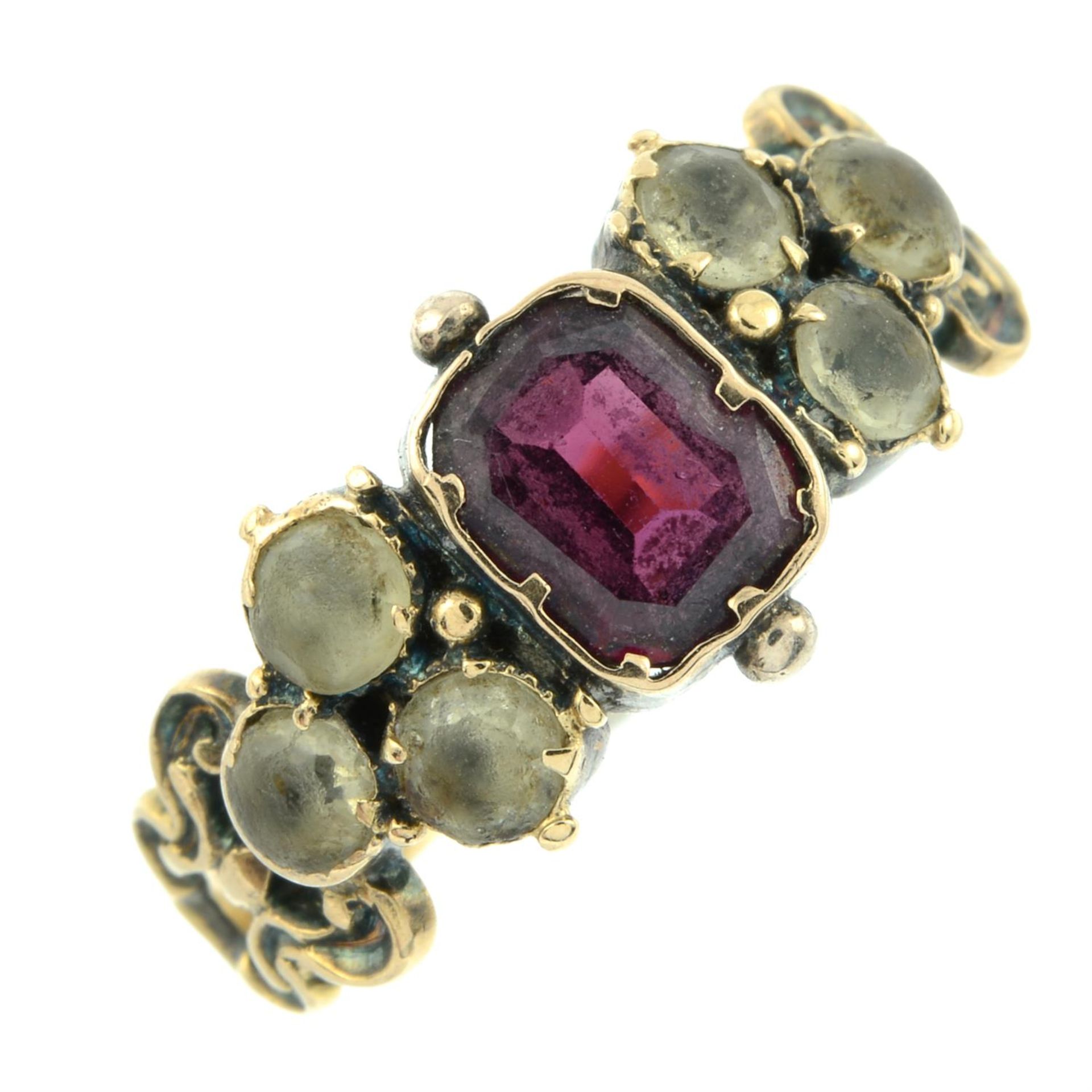 An early to mid 19th century gold garnet and chrysoberyl ring, with scrolling shoulders. - Image 2 of 5