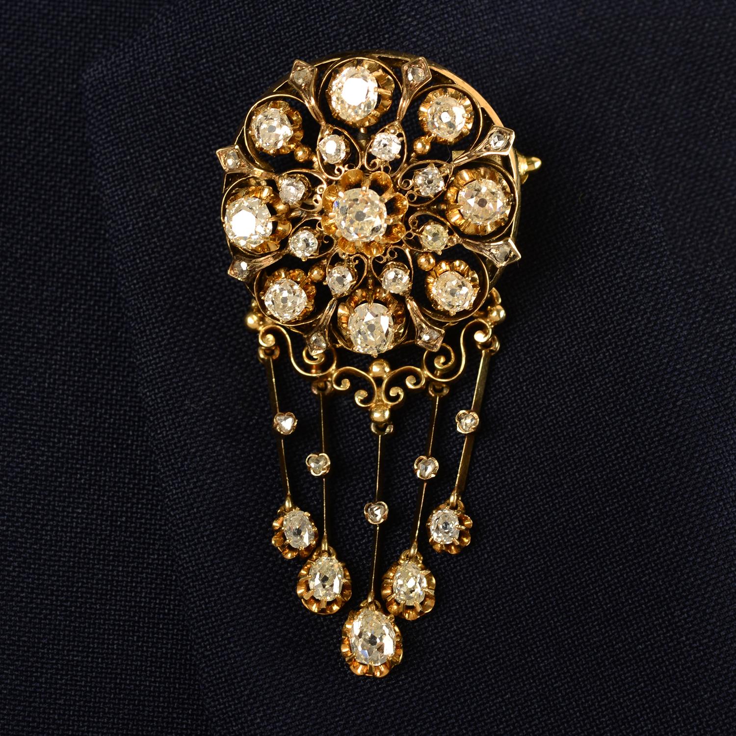 A late 19th century 18ct gold old-cut diamond fringe brooch/necklace.