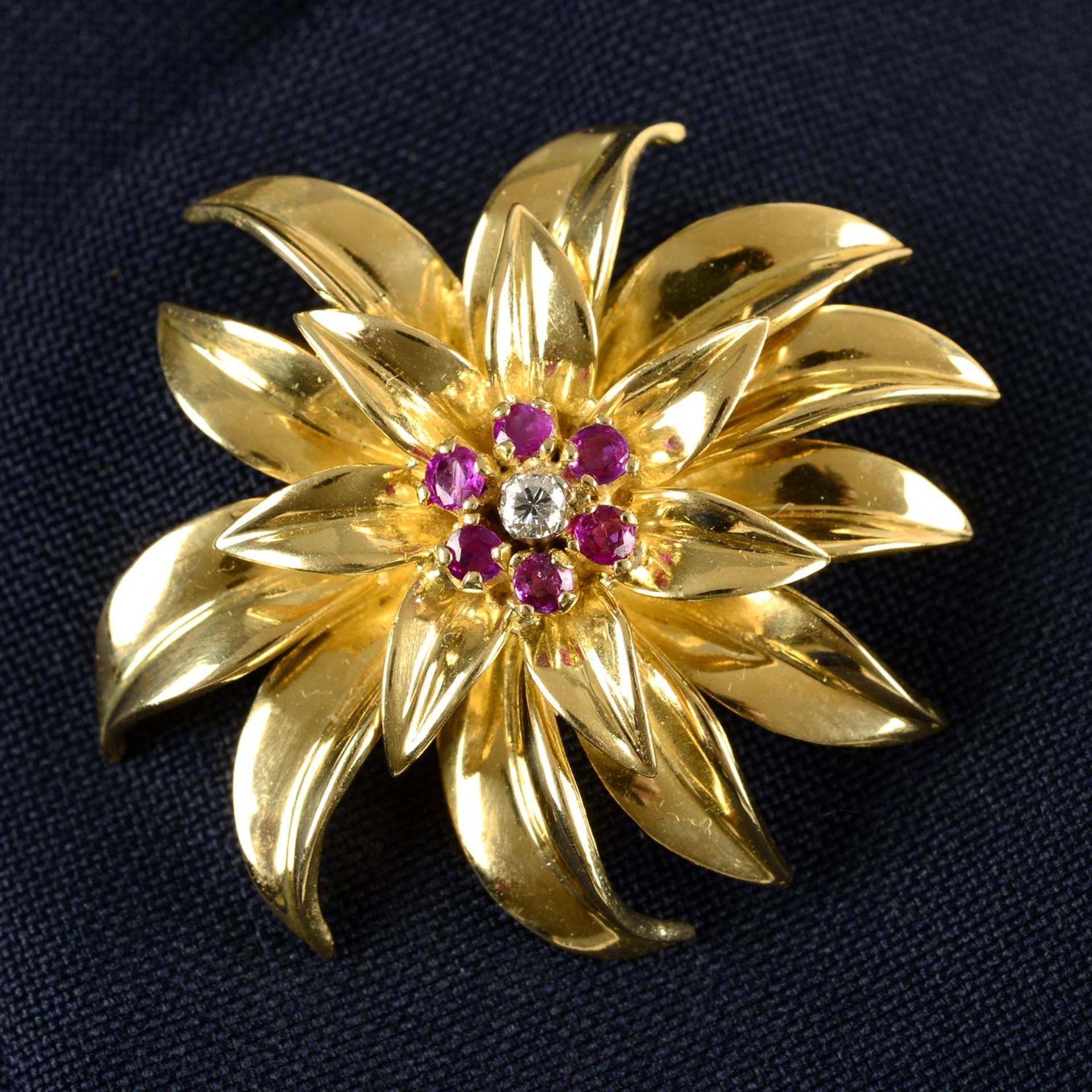A mid 20th century 18ct gold diamond and ruby floral brooch/pendant, by Tiffany & Co.