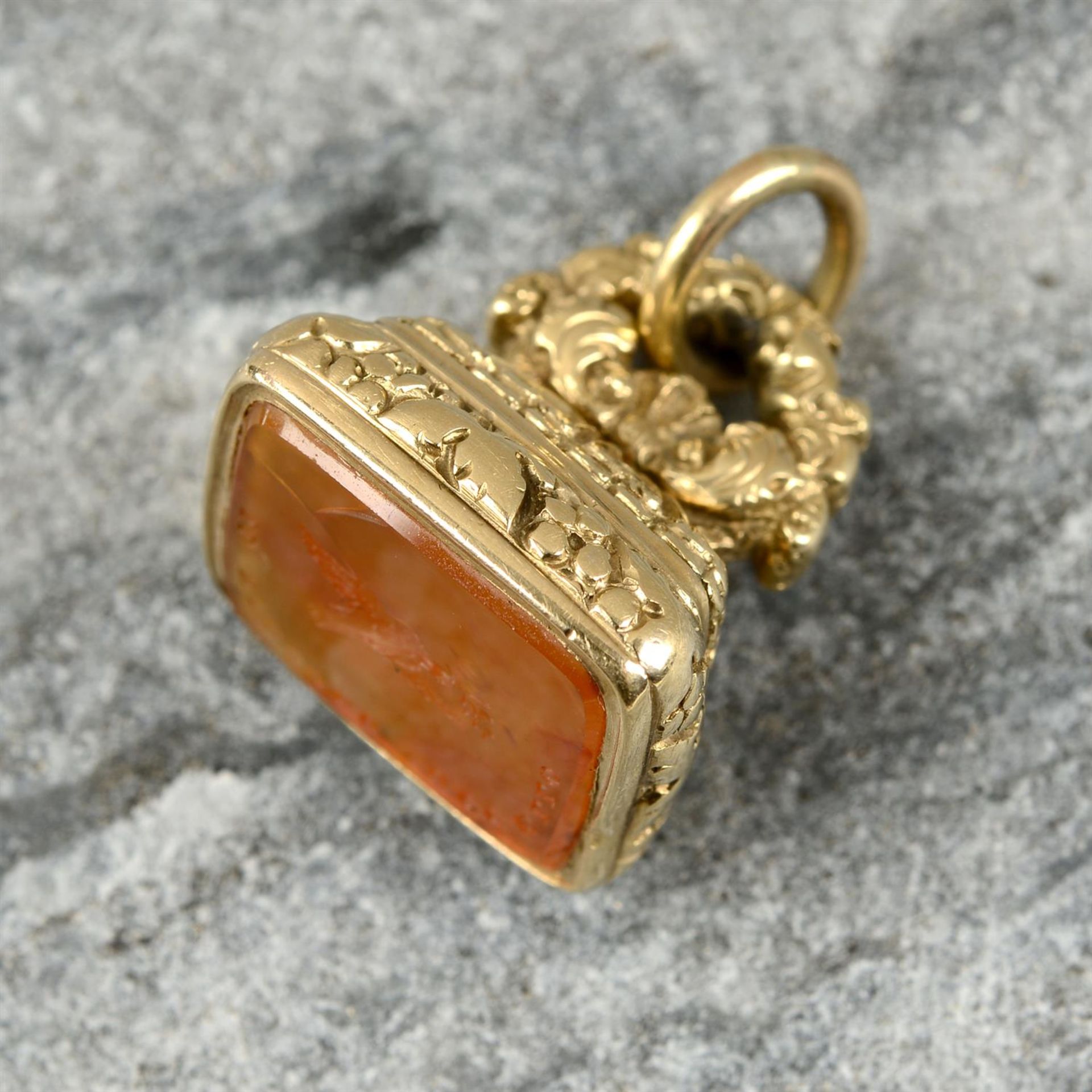 A 19th century gold agate 'a little bird told me' fob seal, engraved with a dove holding an olive