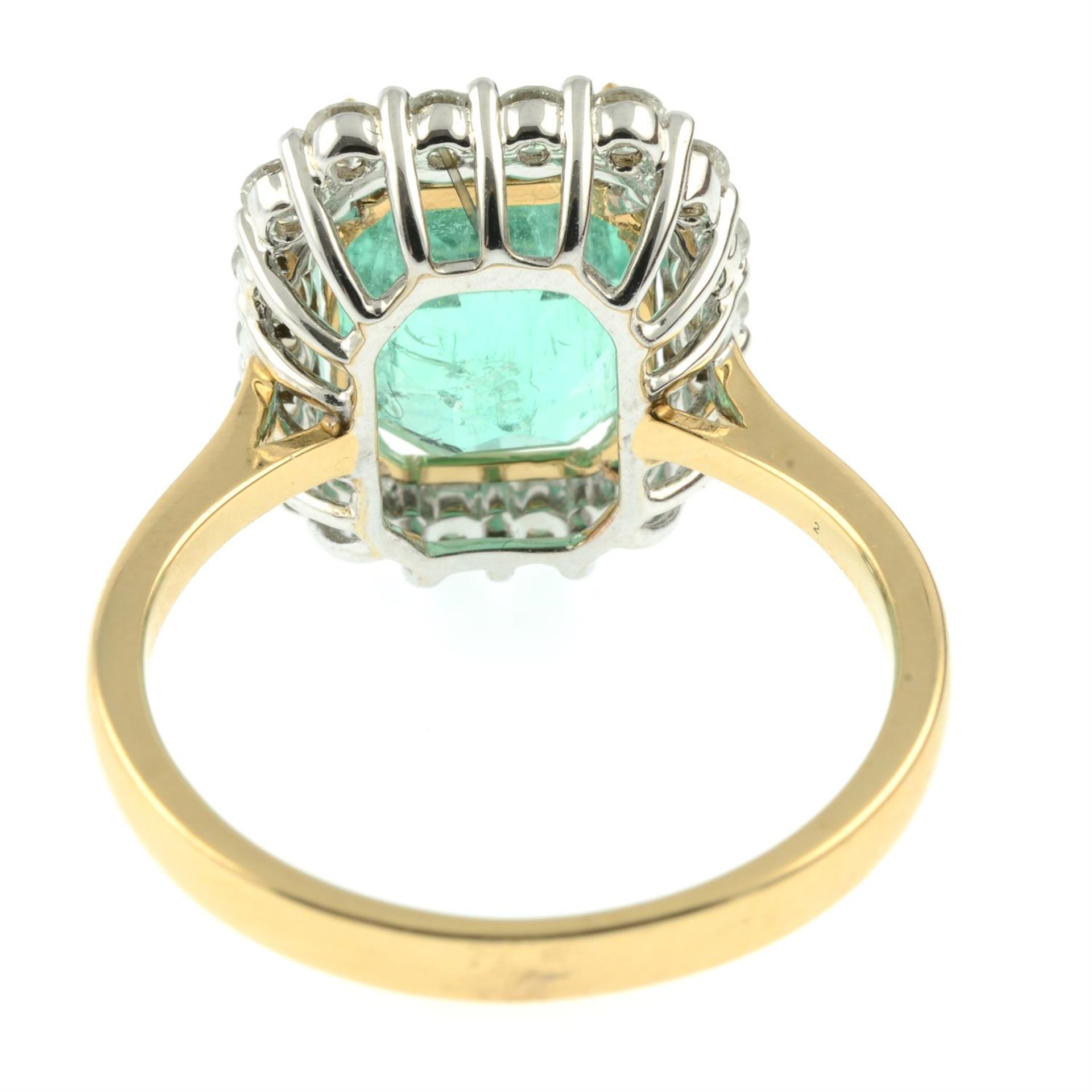 An 18ct gold Colombian emerald and brilliant-cut diamond cluster ring. - Image 4 of 6