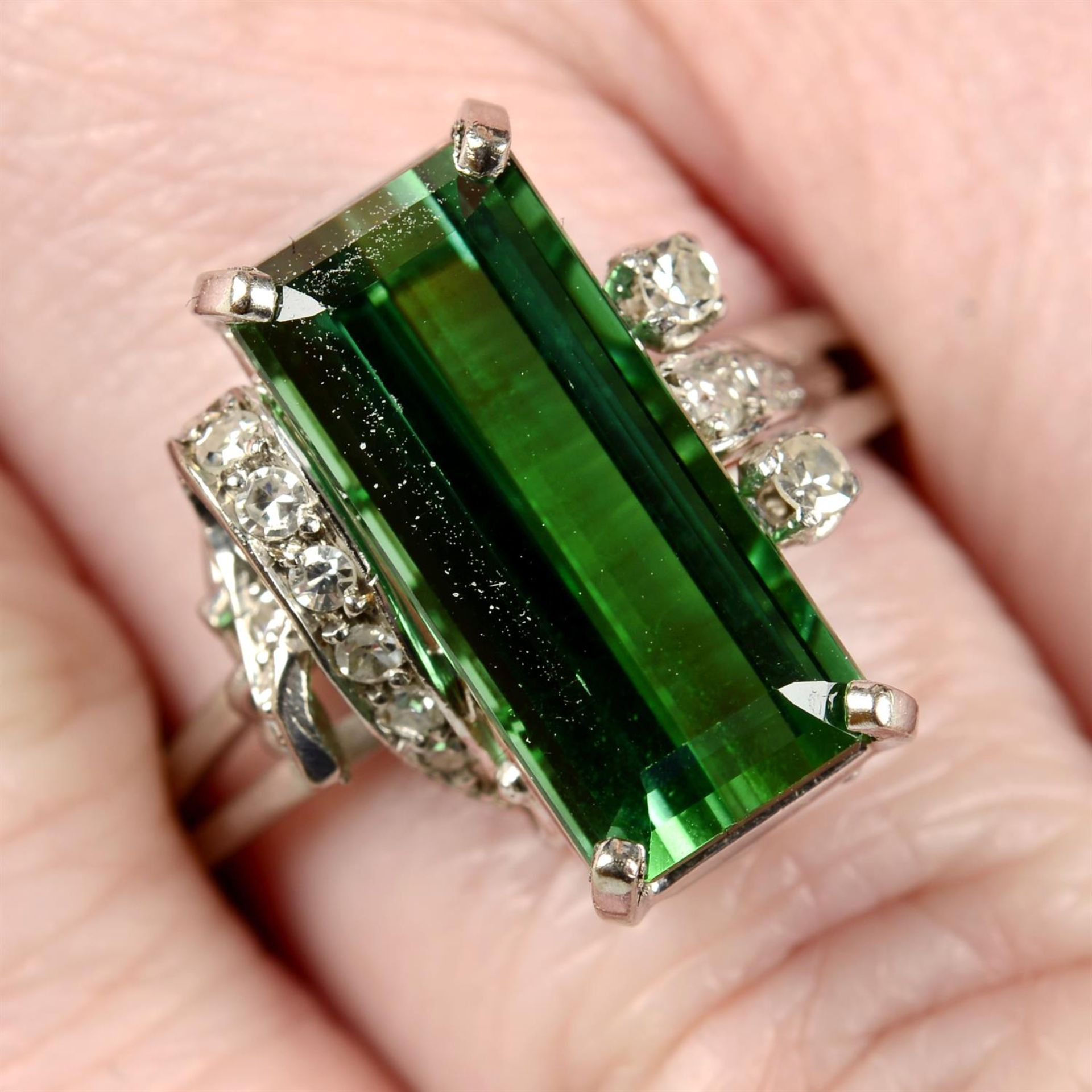 A mid 20th century green tourmaline and single-cut diamond ring.