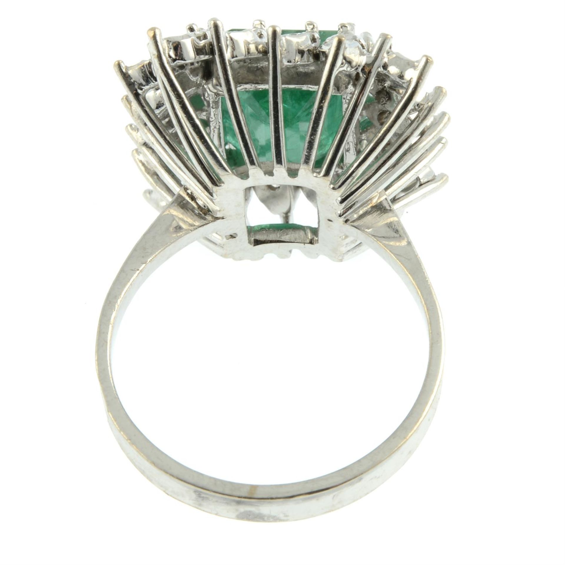 A mid 20th century 18ct gold Brazilian emerald and brilliant-cut diamond cluster ring. - Image 4 of 5