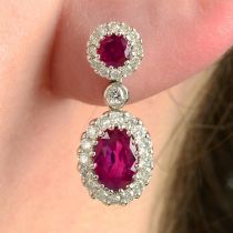 A pair of 18ct gold brilliant-cut diamond and ruby cluster drop earrings.