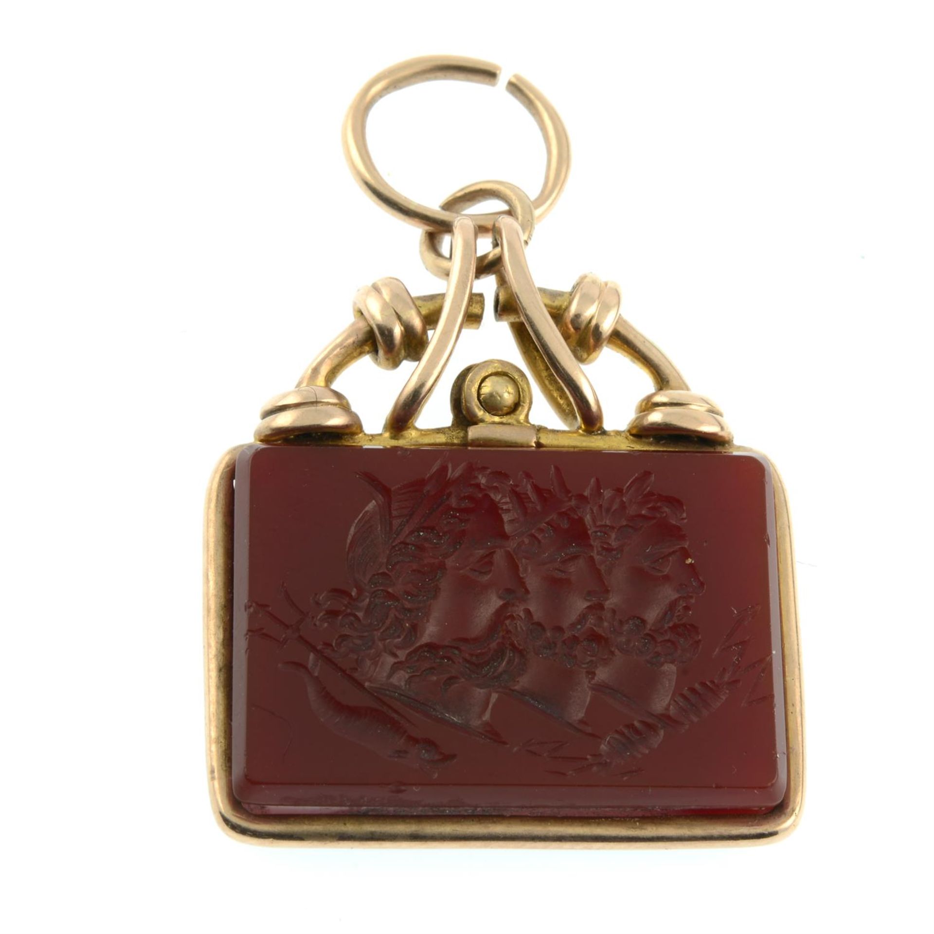 A 19th century gold carnelian intaglio pendant, carved to depict Zeus, Poseidon and Hades in - Image 2 of 3