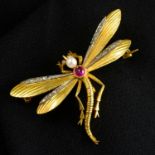 An early 20th century gold seed pearl, synthetic ruby cabochon and diamond point dragonfly brooch.