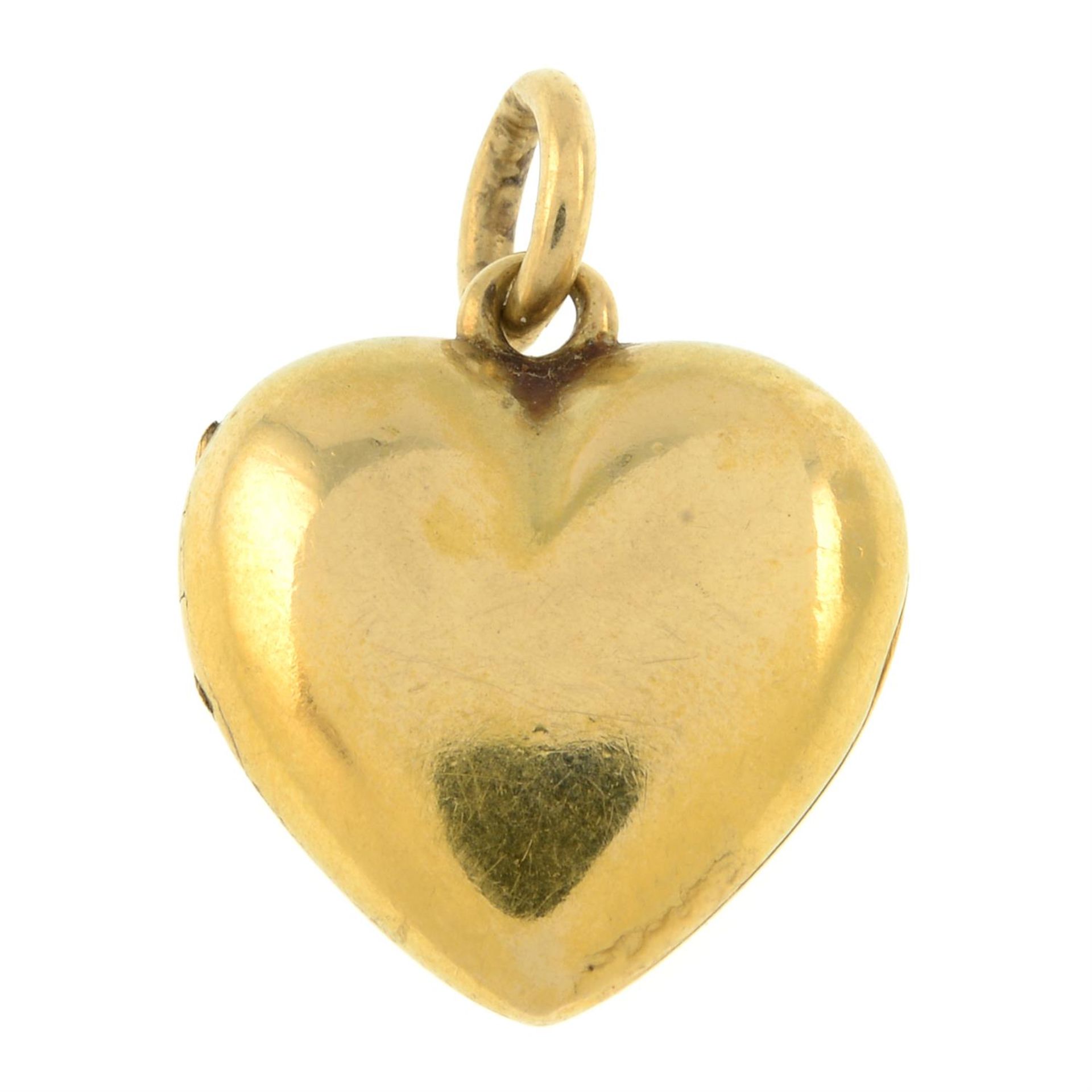 An early 20th century 18ct gold heart locket pendant. - Bild 2 aus 5