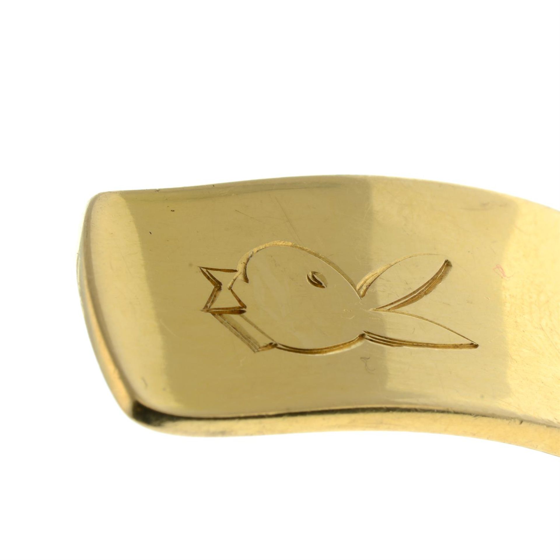 A 1970s 18ct gold flared bangle, by Georg Jensen, with later engraved bunny. - Image 4 of 4