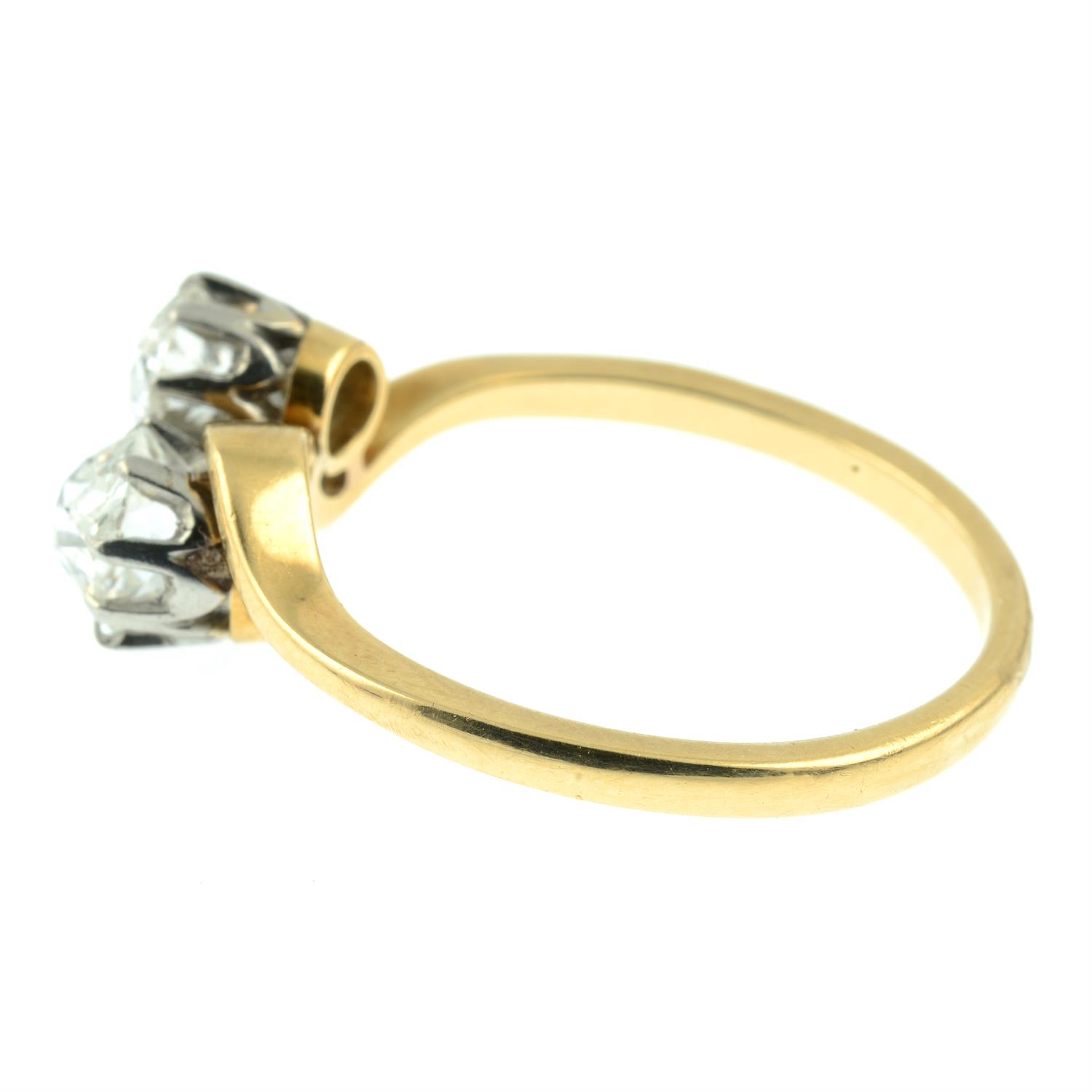 An early 20th century 18ct gold old-cut diamond two-stone crossover ring. - Image 3 of 5